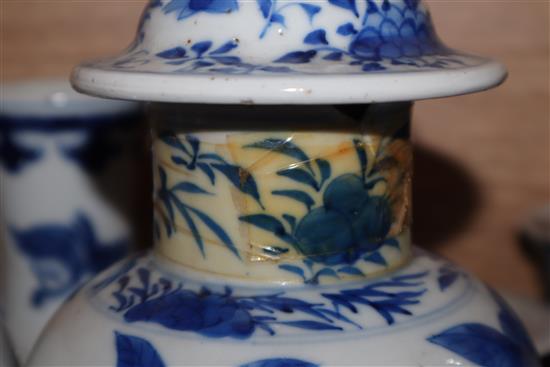 A large collection of 19th century Chinese blue and white vases, bowls, etc. and two famille rose pots